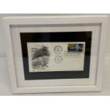 A framed and glazed American 1969 first day cover "Man's First Landing On The Moon".