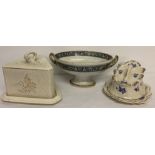 2 antique ceramic cheese dishes. One with floral detail the other with bird decoration.