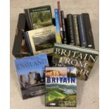 A box of books containing a quantity of large hardback books relating to Britain.