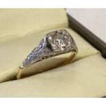 A vintage 18ct. gold diamond set solitaire style ring, approx. .20ct.