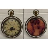A brass cased top winding pocket watch with beaded detail to surround front and back.