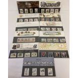 A collection of 11 Royal Mail postage stamp collectors presentation packs.