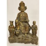 A large Chinese hollow bronze figure of an Oriental Deity, with painted detail.