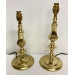 2 matching brass table lamps in a classical style.