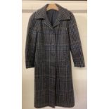 A vintage ladies Irish tweed pure wool full length coat by Julius. Size 12.