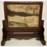 A small wooden framed Chinese dream stone screen.