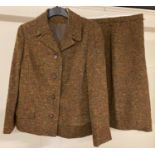 A ladies vintage 2 piece wool skirt and jacket suit.