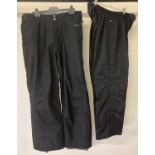 2 pairs of black outdoor activity/ski trousers.