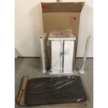 A brand new, in box unassembled over bed table on swivel wheels by HomeCom.