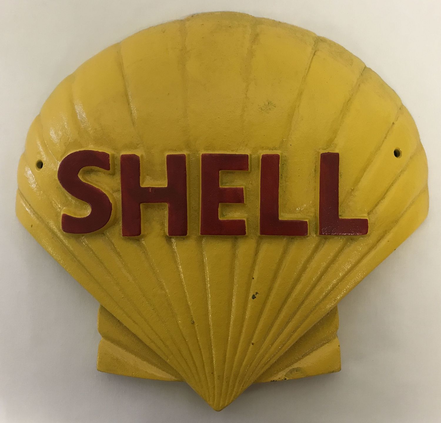 A large convex painted cast iron wall hanging advertising plaque for Shell.