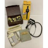 A collection of vintage medical equipment to include slimming aid part cupping set.