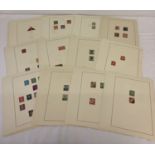 A collection of Dutch and German antique and vintage postage stamps used and unused.