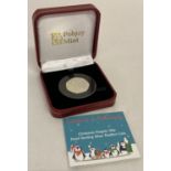 A Limited Edition Pobjoy Mint silver proof Piedfort Falkland Islands Christmas Penguin 50p coin.