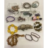 A quantity of assorted costume jewellery bracelets and bangles.