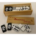A wooden boxed set of 28 dominoes with Youngers Beer logo to backs.