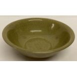 A Chinese crackle glazed celadon dish with floral design to inner bowl.