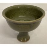 A Chinese porcelain celadon glazed stemmed bowl.