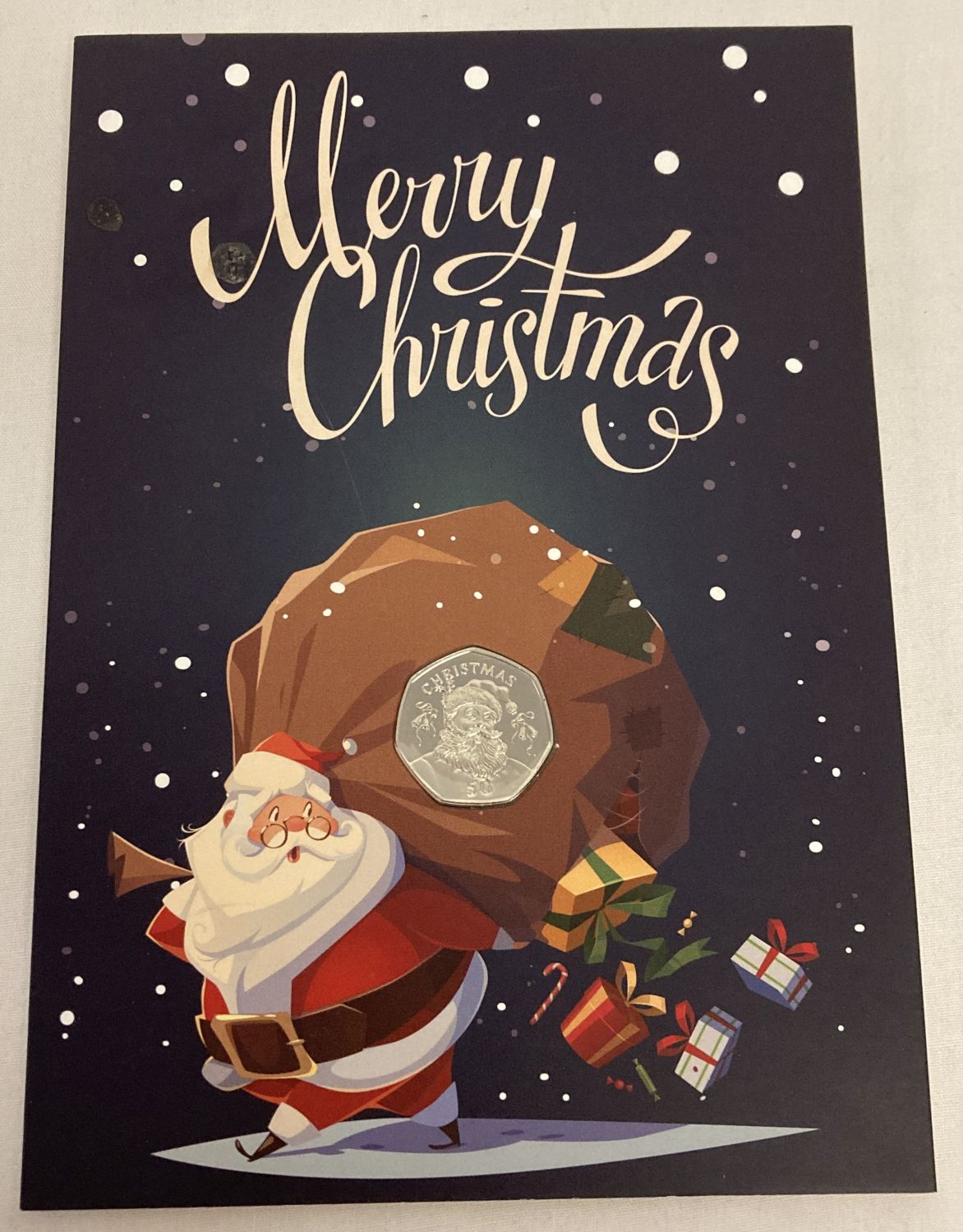 A Limited Edition Christmas card with sealed Gibraltar 2017 commemorative Christmas 50p coin.