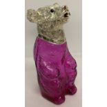 A pink/purple glass and silver plated novelty bear shaped decanter.