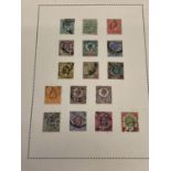 A sheet of 16 Edward VII postage stamps, all with frank marks.