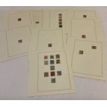 A collection of 24 Victorian stamps on loose album sheets.
