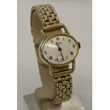 A ladies gone tone bracelet watch by Rotary. Oval shaped face with roman numeral hour markers.