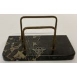A German WWII style marble based desk letter rack set with metal Nazi Military Police insignia.