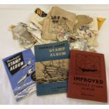 3 vintage stamp albums together with a quantity of vintage loose stamps and envelopes.