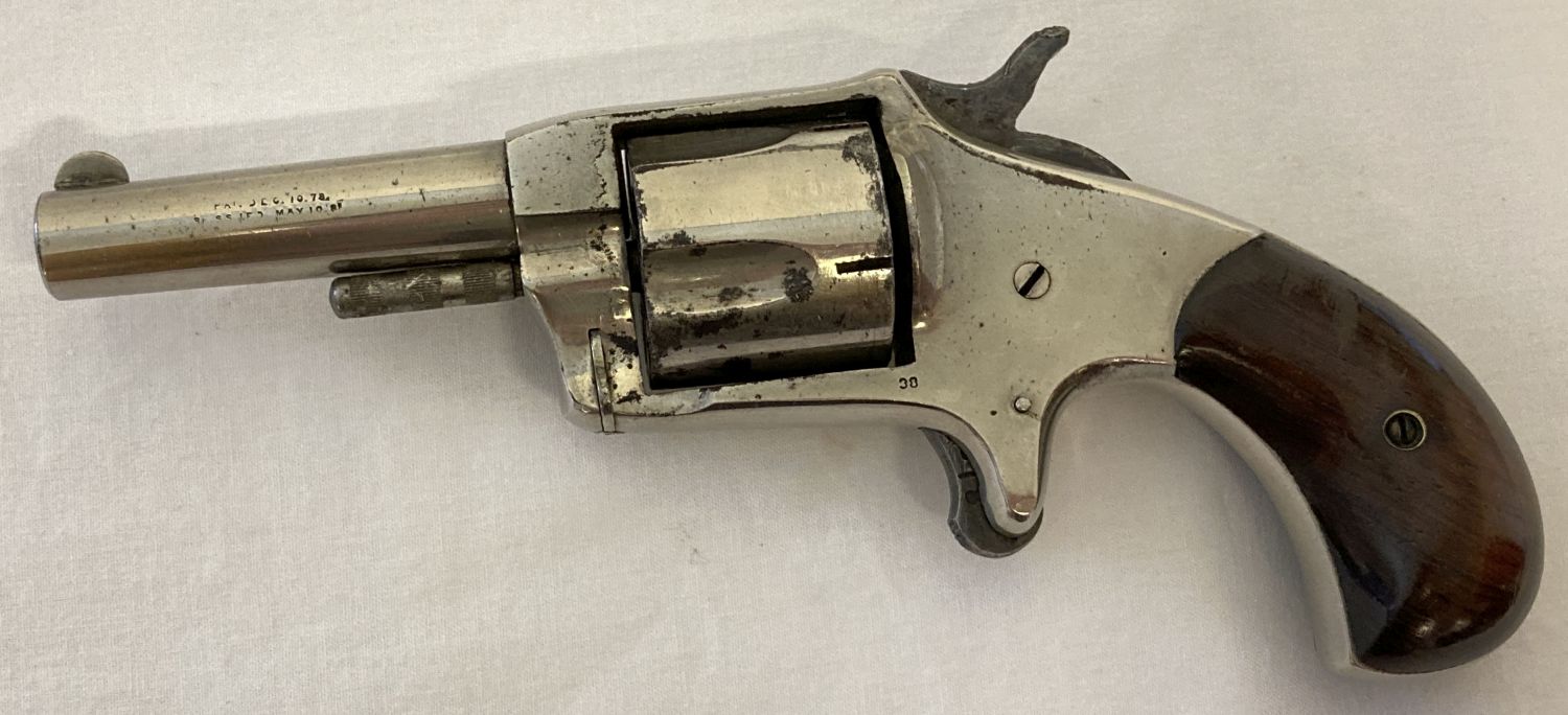 An antique 5 shot .38 Rim Fire "Conqueror" pistol with wooden grip