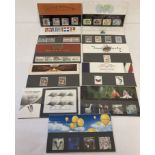 A collection of 11 Royal Mail postage stamp collectors presentation packs.