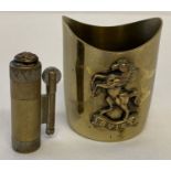 2 pieces of British WWI trench art. A "Tommy" lighter with button set to lid.