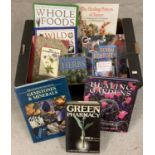 A box of books relating to Herbal remedies and the healing power of nature.