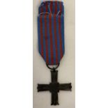 A post war Monte Cassino Medal Of Honour on blue and red ribbon.