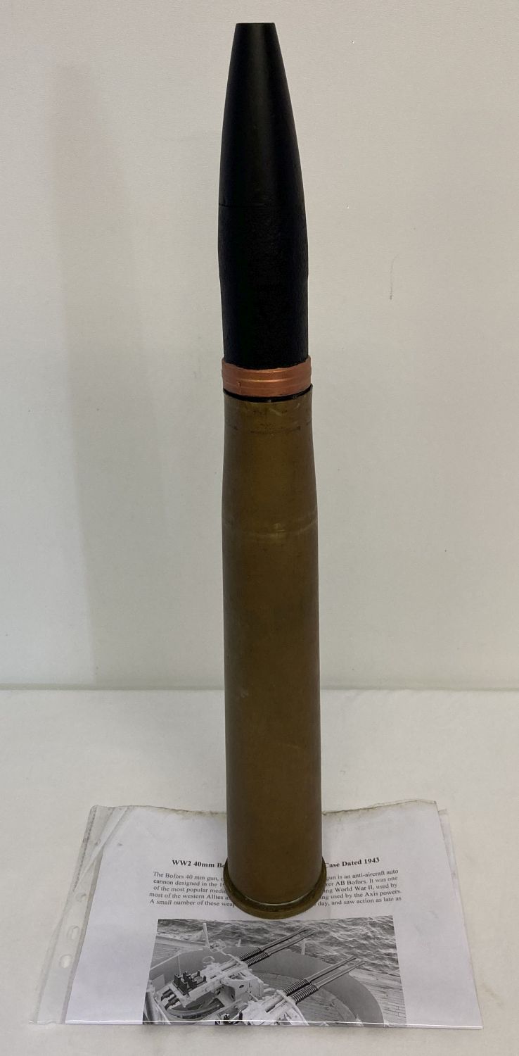 A WWII Bofors Anti Aircraft round, dated 1943 - empty shell case with resin head.