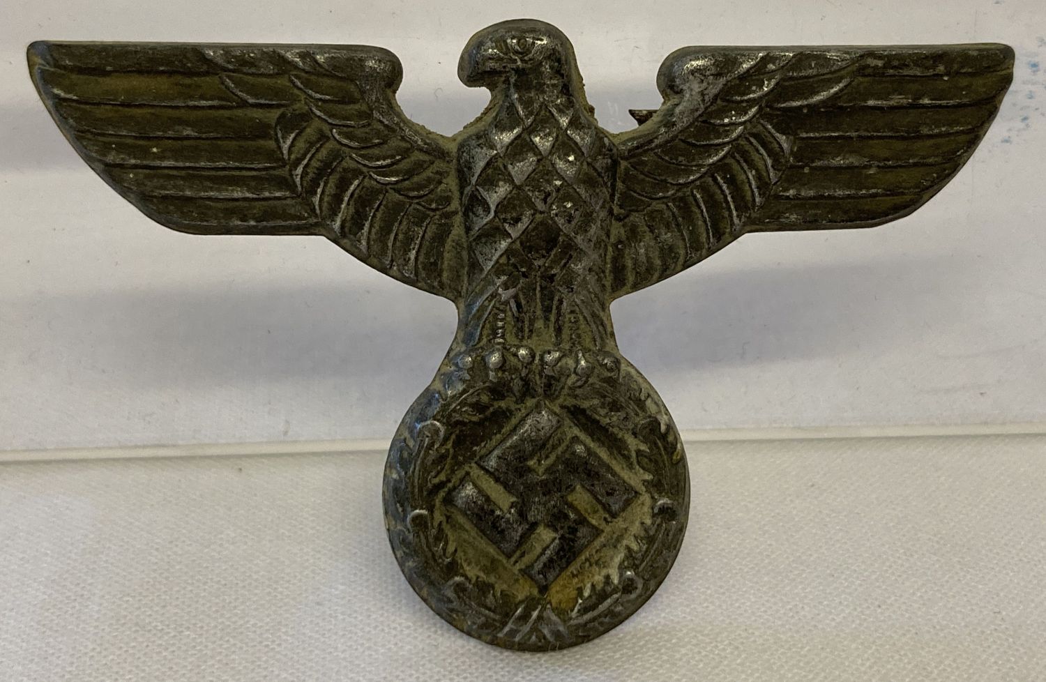 A German WWII style S.A. kepi hat eagle.