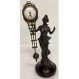 A bronze based figural, swinging pendulum mystery clock.