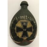 A German WWI metal water bottle decorated with hand painted post war memorial "Gott Mit Uns" detail.