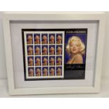 A framed & glazed complete pane of unused American 1995 Legends Of Hollywood Marilyn Monroe stamps.