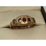 An antique 15ct gold and ruby dress ring, for scrap or repair.