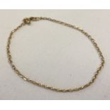A 9ct gold fine belcher chain bracelet with spring clasp.