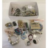 A box of vintage and modern jewellery necklaces, bracelets and bangles.