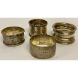 4 vintage hallmarked silver napkin rings, 2 with engraved monograms.