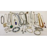 A tray of vintage and modern diamante, glass bead and stone set jewellery.