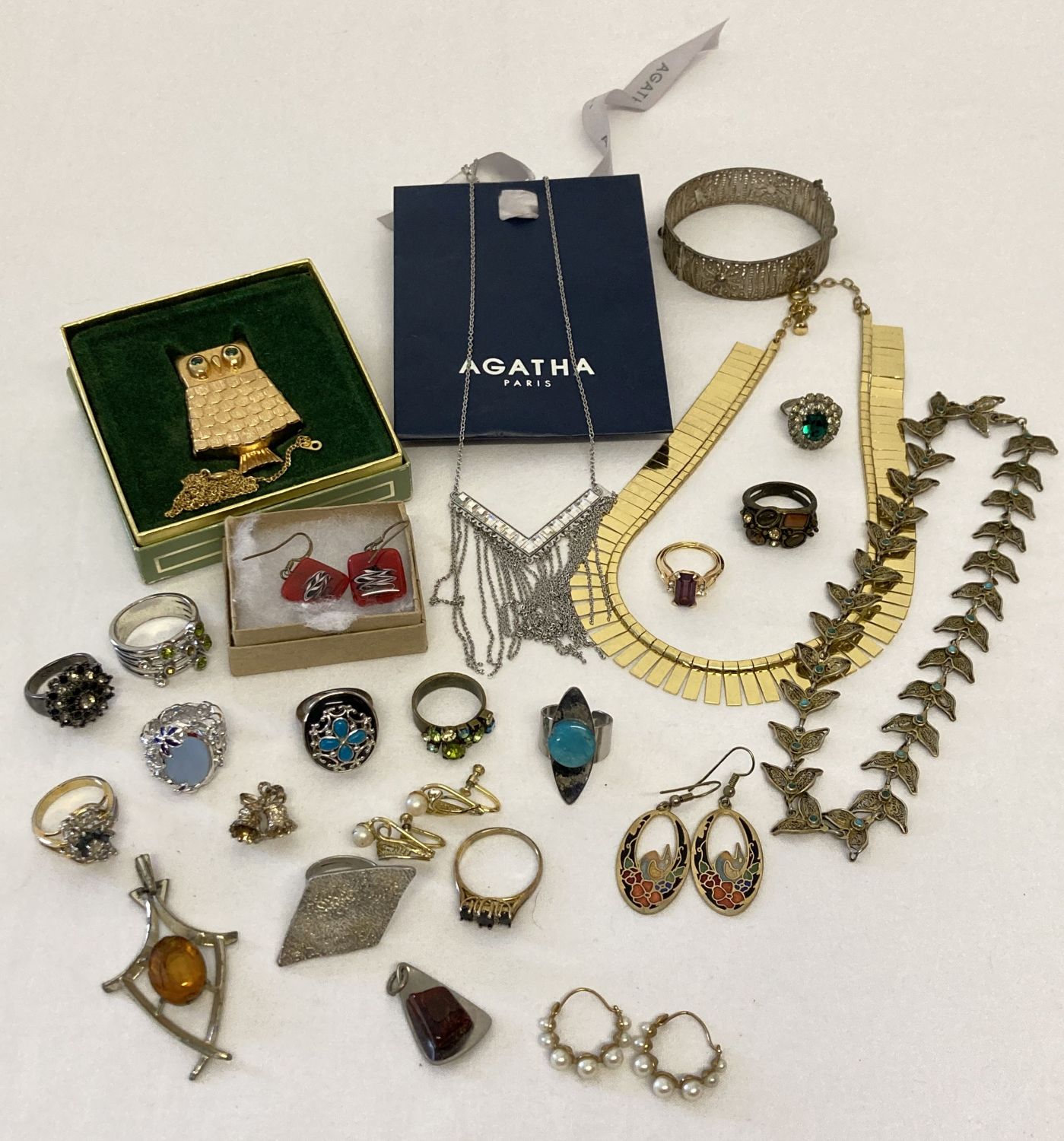 A collection of vintage and modern costume jewellery.