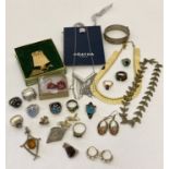 A collection of vintage and modern costume jewellery.