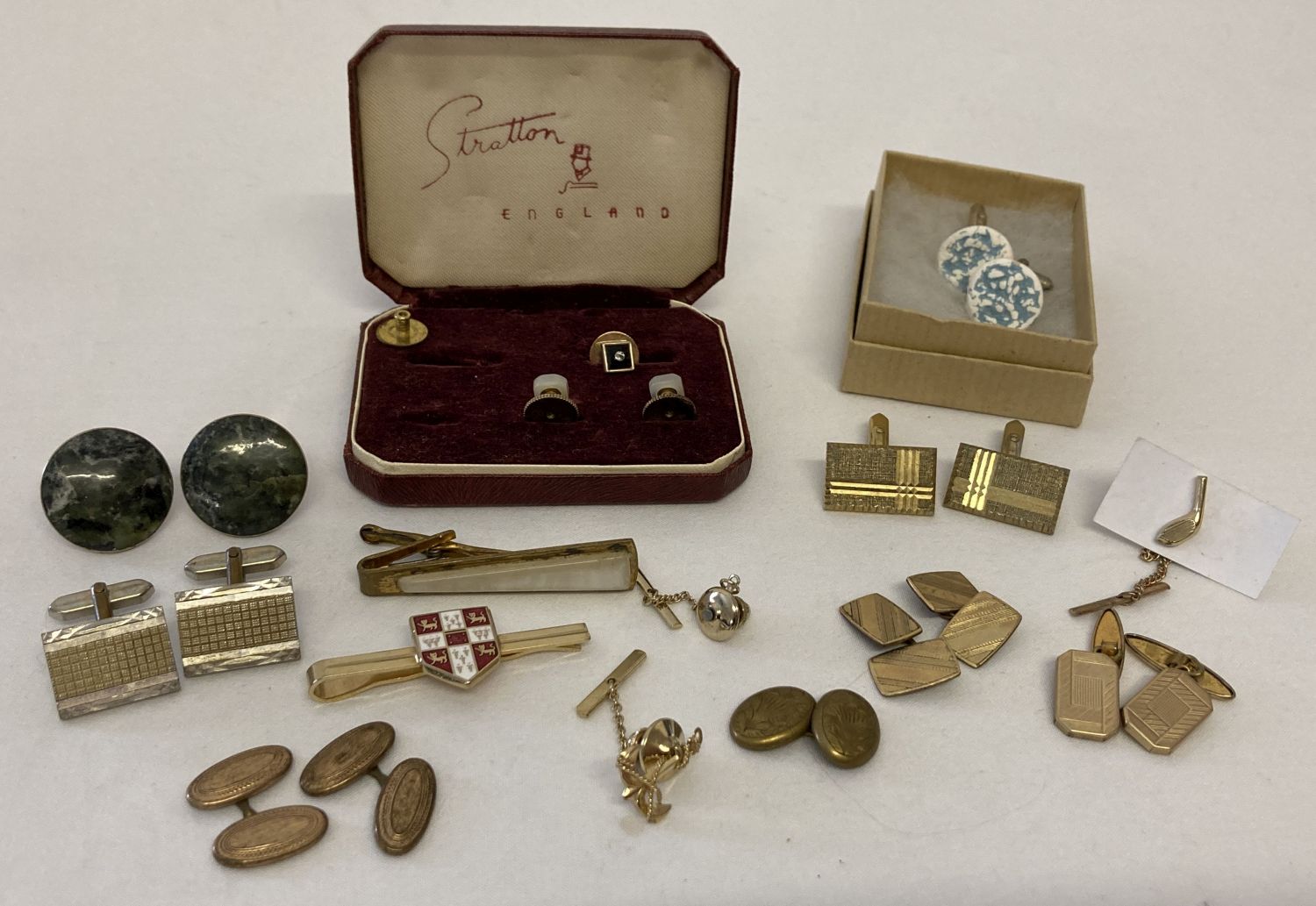 A collection of vintage tie pins, cuff links and shirt studs. To include rolled gold.