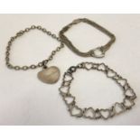 3 silver bracelets. Heart link bracelet, belcher chain with heart shaped charm and a multi chain