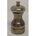 A modern silver pepper grinder hallmarked Birmingham, 2010.