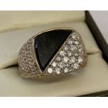 A vintage yellow gold men's signet ring, set with 1ct diamonds and black onyx.