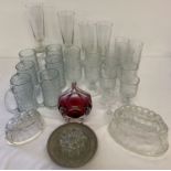 A collection of vintage glassware to include Whitefriars style bark effect glasses.
